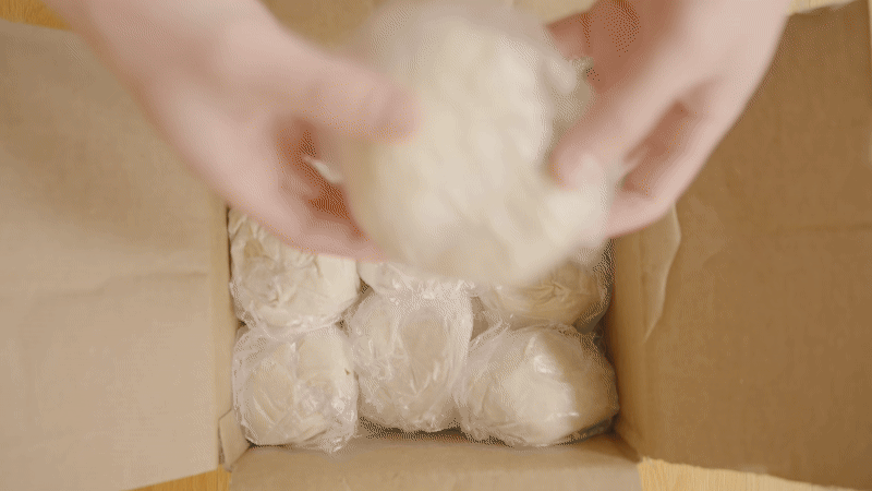 Taking a frozen dough ball out of the box